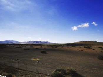 Scenic view of desert against sky