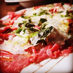 Close-up of pizza served in plate