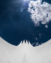 Low angle view of building against cloudy sky