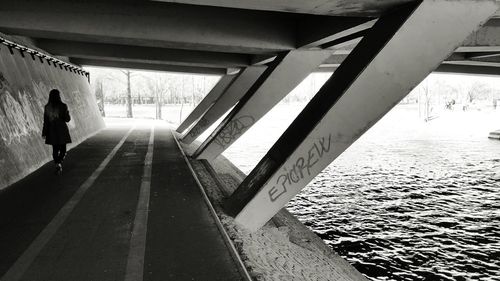 People walking on bridge