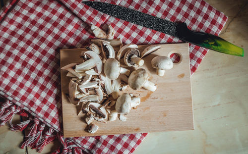 High angle view of chopped mushrooms on table
