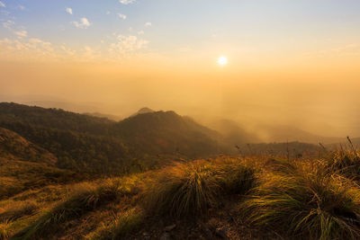 Scenic view of landscape against sky during sunset