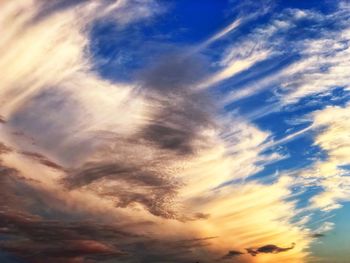 Low angle view of clouds in sky during sunset