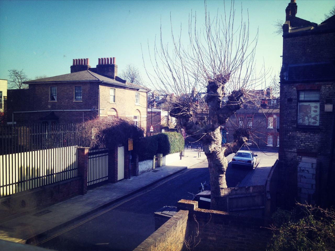 building exterior, architecture, built structure, house, residential building, residential structure, sky, building, bare tree, city, clear sky, tree, dusk, outdoors, no people, residential district, day, old, church, town