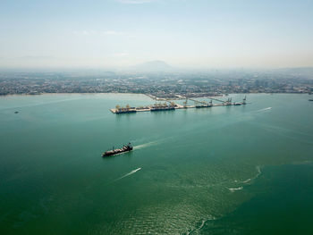 High angle view of ship in sea against sky