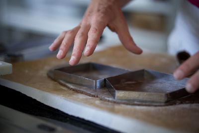 Preparing homemade christmas gingerbread houses