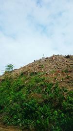 Low angle view of land against sky