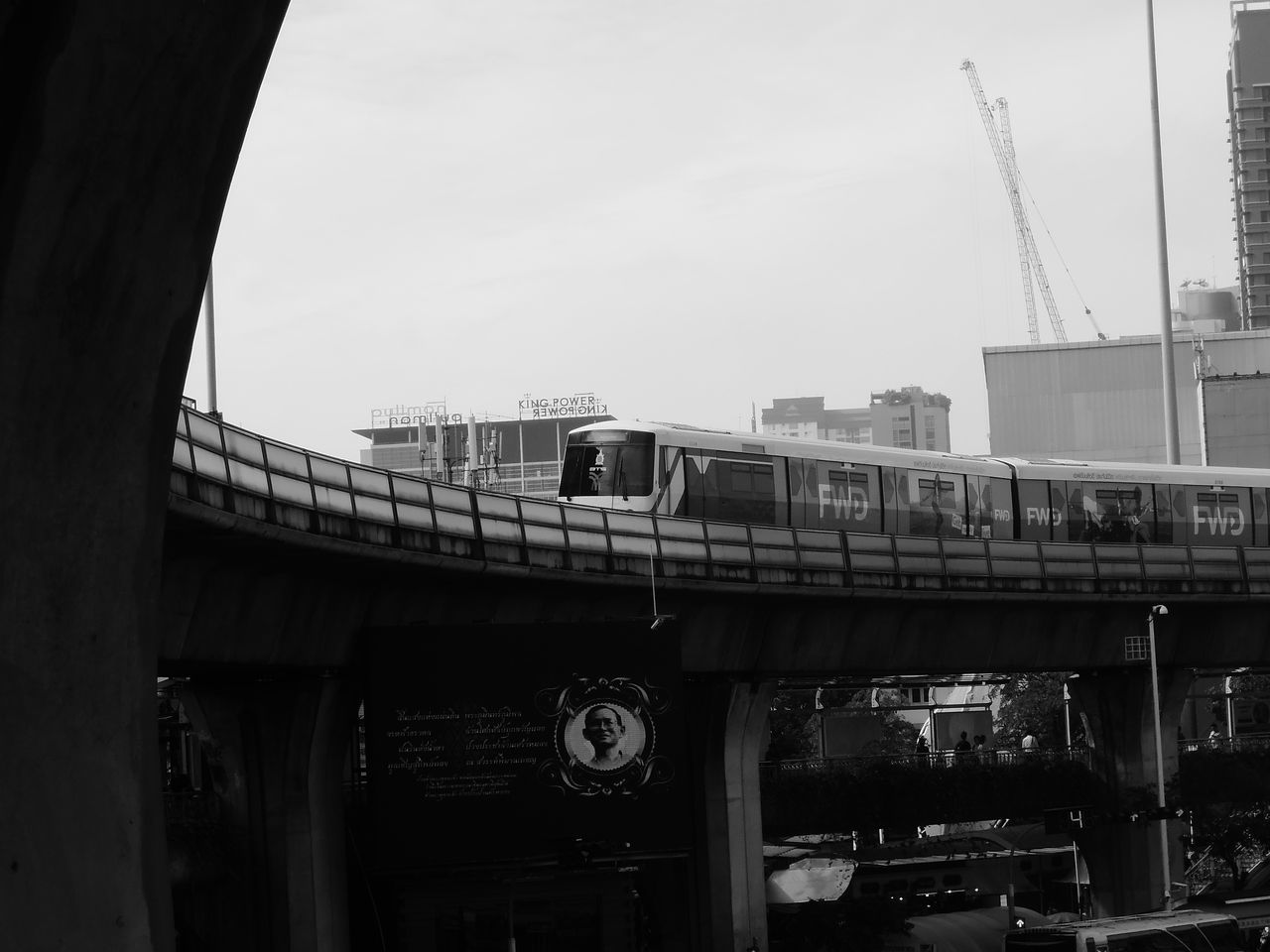 LOW ANGLE VIEW OF BRIDGE IN CITY