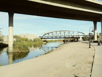 Bridge over river against sky