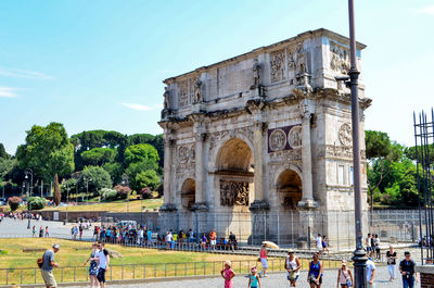 Group of people in front of historical building