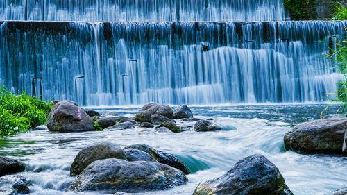 Scenic view of waterfall in forest