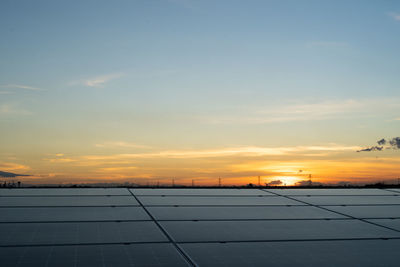 Scenic view of landscape against sky during sunset