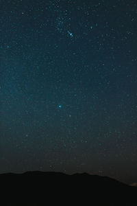 Low angle view of stars in sky at night