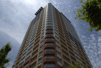 Low angle view of office building against sky