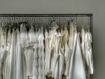 Close-up of clothes hanging on rack