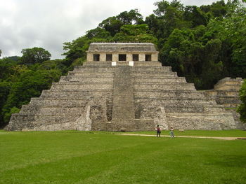 People in front of historical building