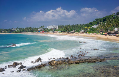 Scenic view of beach against sky