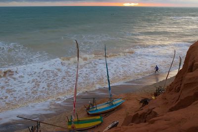 High angle view of beach by sea against sky