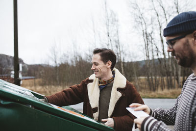 Man and son in park during winter