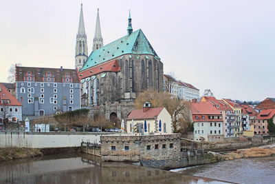 Oder embankment and city church in görlitz, germany