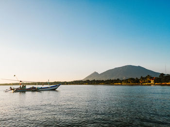 Scenic view of sea against clear sky