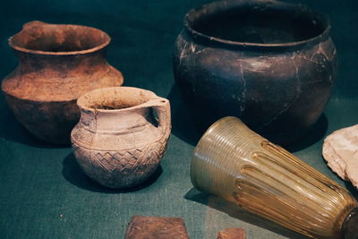 Close-up of old containers