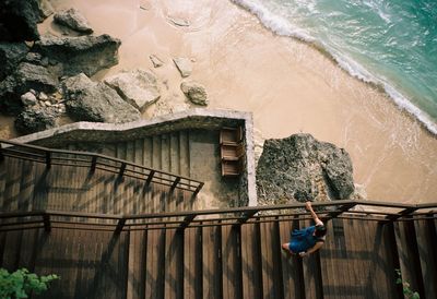 Woman standing on rock