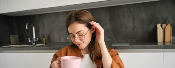 Young woman using mobile phone