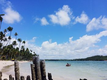 Scenic view of sea against blue sky