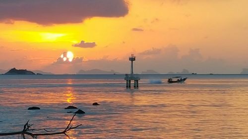 Scenic view of sea at sunset