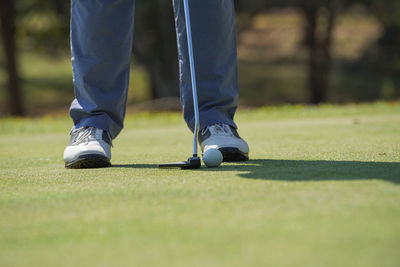 Low section of man on golf course