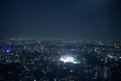 Illuminated cityscape at night