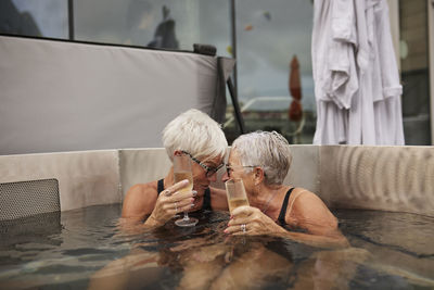 Senior women relaxing in hot tub