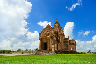 View of temple against cloudy sky