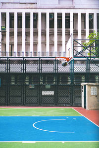 View of basketball court against building