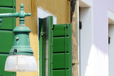 Close-up of green door of building