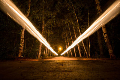 Illuminated street lights at night