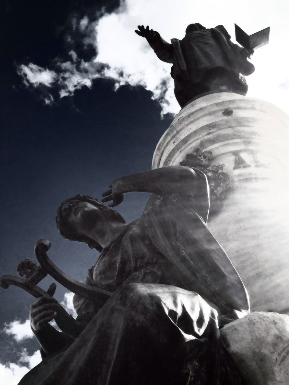 statue, low angle view, sculpture, sky, human representation, art and craft, art, creativity, cloud - sky, animal representation, horse, cloud, no people, cloudy, outdoors, day, close-up, religion, carving - craft product