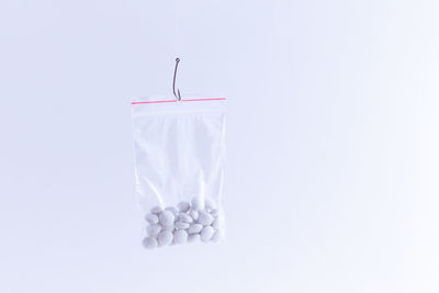 High angle view of blue liquid against white background