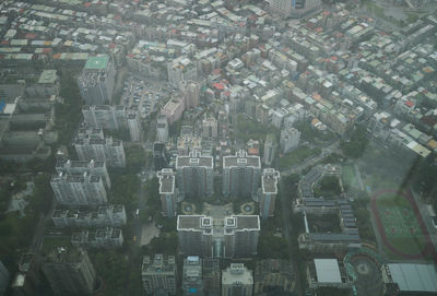 High angle view of street amidst buildings in city