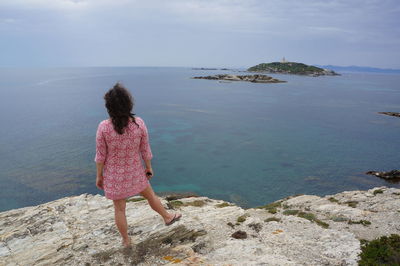 Woman standing on beach