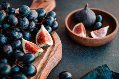 High angle view of fruits on cutting board