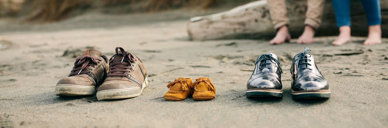 Shoes with couple in background