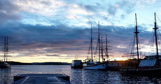 nautical vessel, transportation, boat, mode of transport, moored, water, mast, sky, cloud - sky, sunset, sailboat, sea, harbor, cloudy, cloud, reflection, beauty in nature, nature, scenics, tranquility