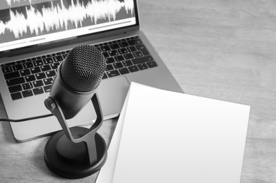 Close-up of microphone on table