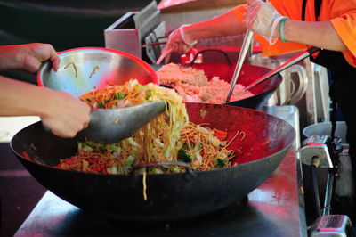 Asian stir fry cooking outdoors.