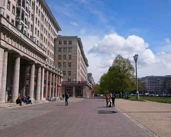 People walking on city street