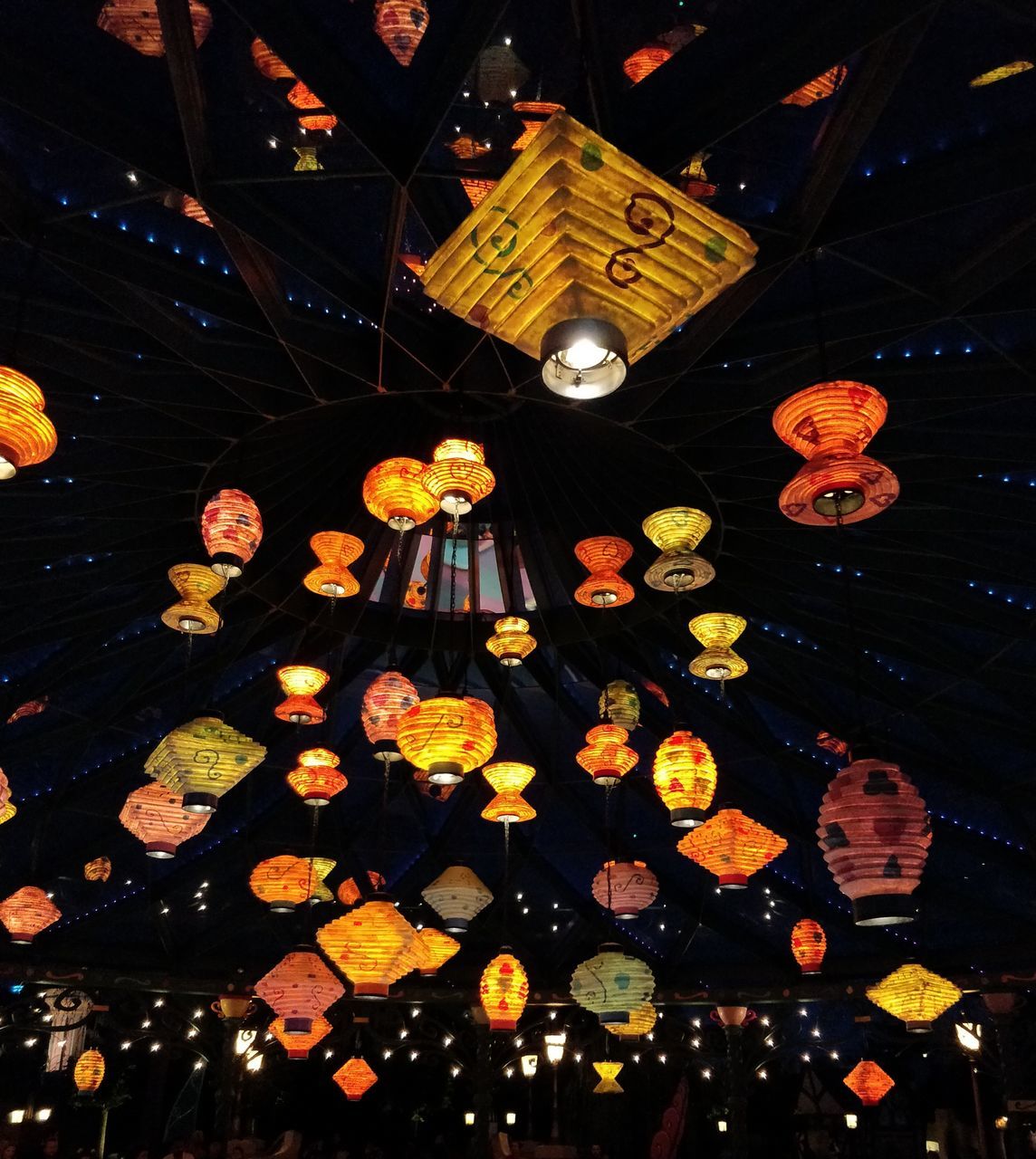 LOW ANGLE VIEW OF ILLUMINATED LANTERNS