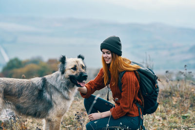 Young woman with dog