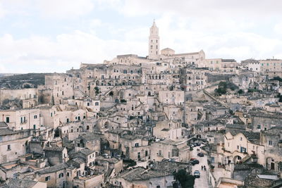 Buildings in city against sky